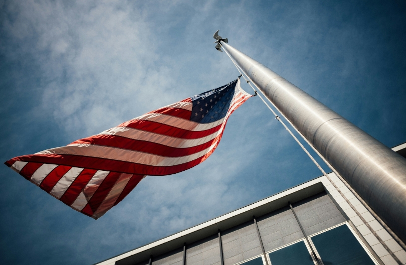 American flag blowing in the wind.